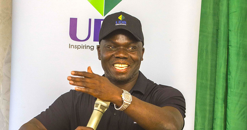 Andama Mahamoud, Director of Investments at UDB speaks during the graduation ceremony