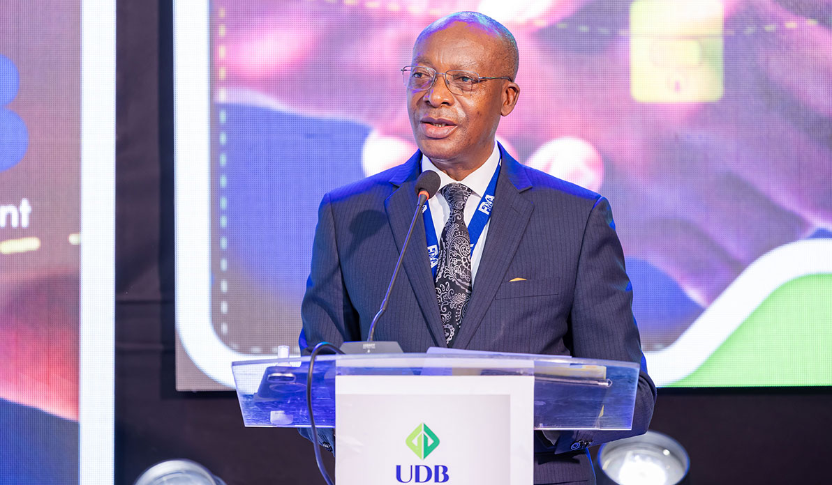 Turamye delivering the keynote address during the forum